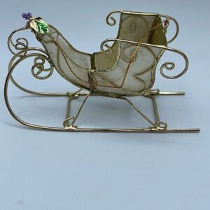 Vintage Capiz shell sleigh ornament .